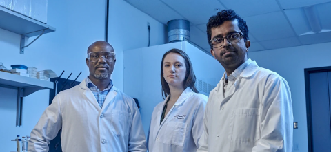 Researchers in lab coats